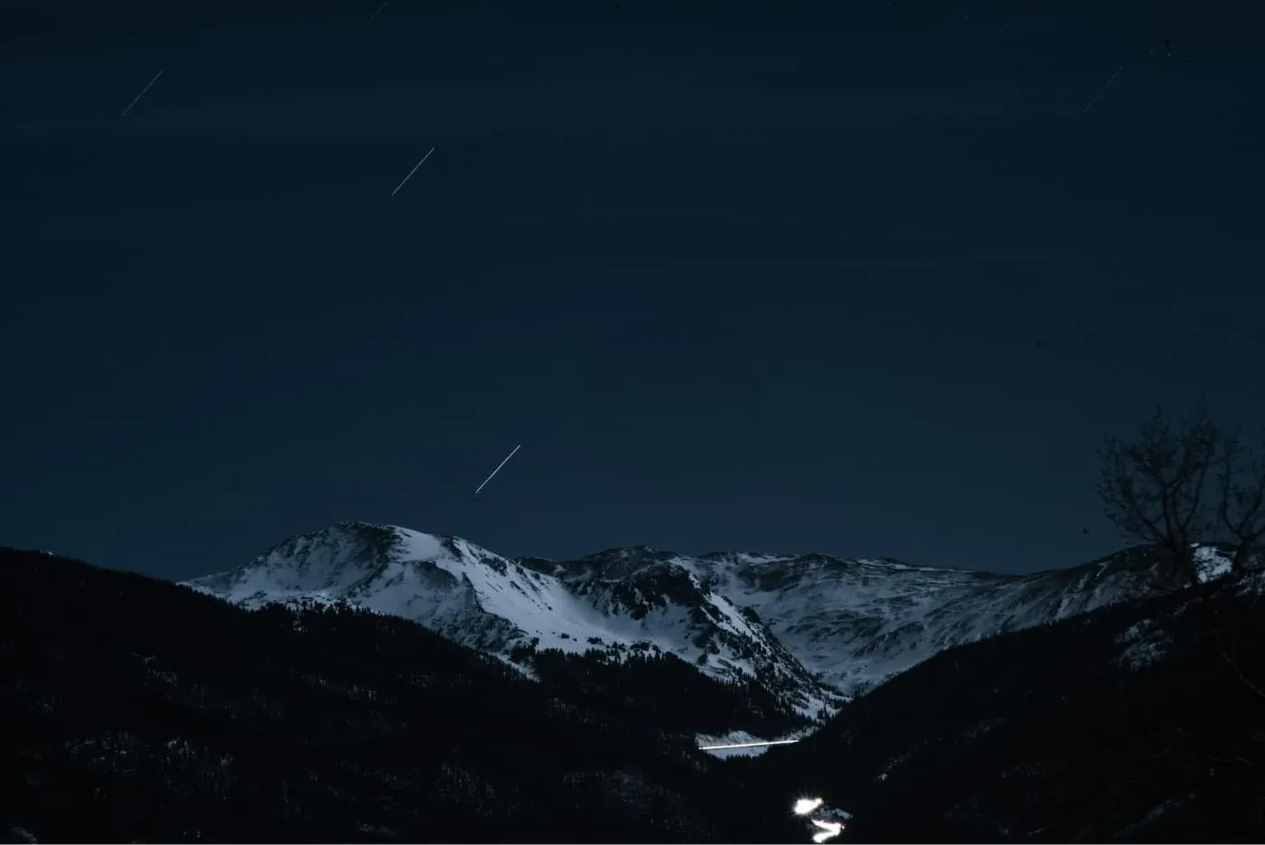 photo of mountains with snow at night